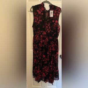 Sleeveless clip dot chiffon fuchsia floral on black background